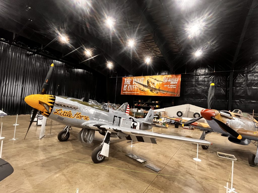 WWII aircraft displayed inside the Flying Legends Hangar at Dakota Territory Air Museum.